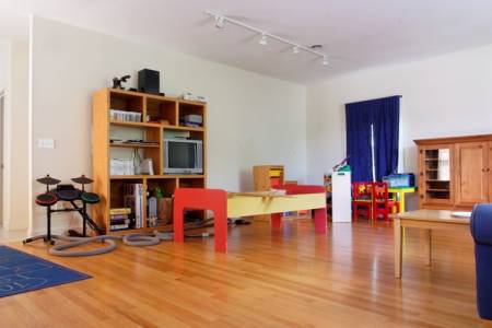Removed_many_of_the_kid's_toys,_a_stained_rug_and_some_old_furniture..jpg